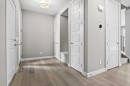 67 Agate Road, Cochrane, AB  - Indoor Photo Showing Other Room 
