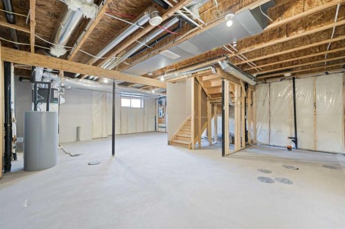 67 Agate Road, Cochrane, AB - Indoor Photo Showing Basement