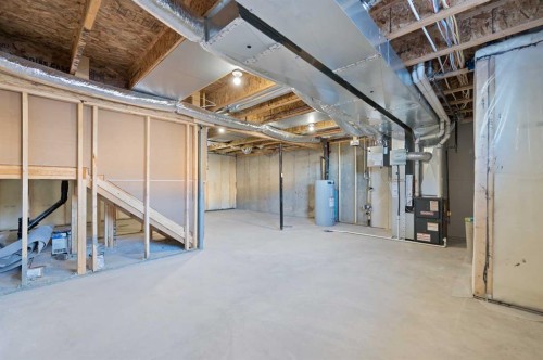 67 Agate Road, Cochrane, AB - Indoor Photo Showing Basement