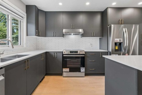 4319 19 Street Nw, Calgary, AB - Indoor Photo Showing Kitchen With Stainless Steel Kitchen With Double Sink With Upgraded Kitchen