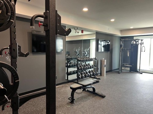 2110-265 Wolf Willow Boulevard Se, Calgary, AB - Indoor Photo Showing Gym Room