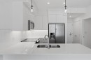 2110-265 Wolf Willow Boulevard Se, Calgary, AB  - Indoor Photo Showing Kitchen With Double Sink With Upgraded Kitchen 