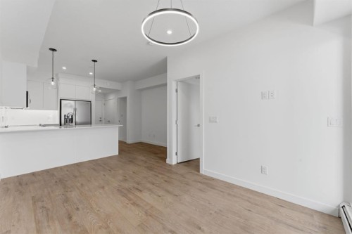 2110-265 Wolf Willow Boulevard Se, Calgary, AB - Indoor Photo Showing Kitchen