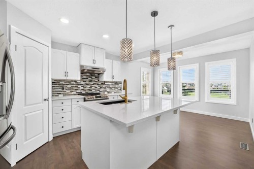 98 Panamount Villas Nw, Calgary, AB - Indoor Photo Showing Kitchen With Upgraded Kitchen