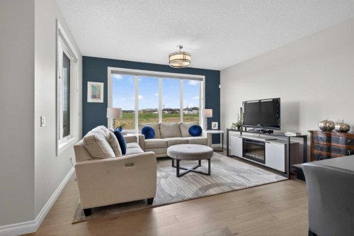 73 Rockyvale Green Nw, Calgary, AB - Indoor Photo Showing Living Room