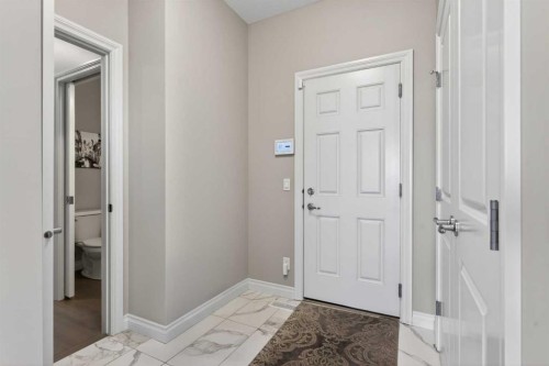 73 Rockyvale Green Nw, Calgary, AB - Indoor Photo Showing Other Room