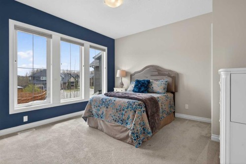 73 Rockyvale Green Nw, Calgary, AB - Indoor Photo Showing Bedroom