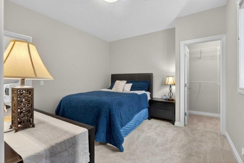 73 Rockyvale Green Nw, Calgary, AB - Indoor Photo Showing Bedroom