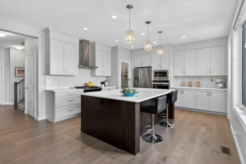 73 Rockyvale Green Nw, Calgary, AB - Indoor Photo Showing Kitchen With Upgraded Kitchen