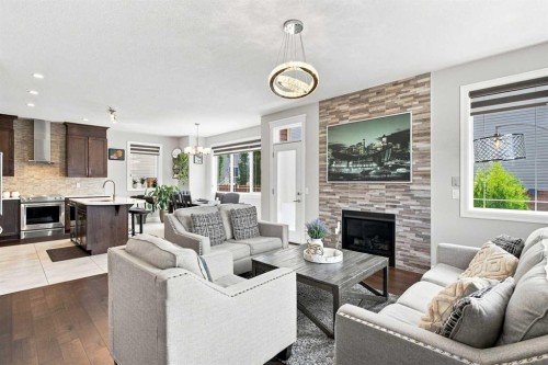 12 Cityside Common Ne, Calgary, AB - Indoor Photo Showing Living Room With Fireplace