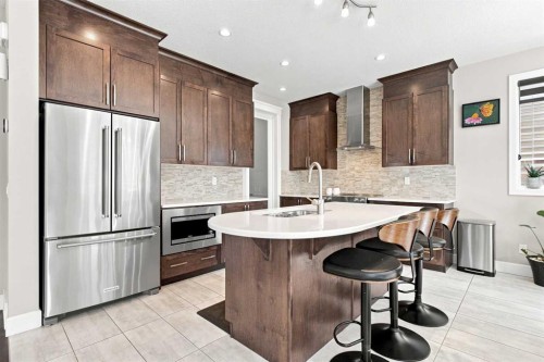 12 Cityside Common Ne, Calgary, AB - Indoor Photo Showing Kitchen With Stainless Steel Kitchen With Upgraded Kitchen