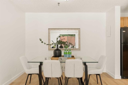 101-930 18 Avenue Sw, Calgary, AB - Indoor Photo Showing Dining Room