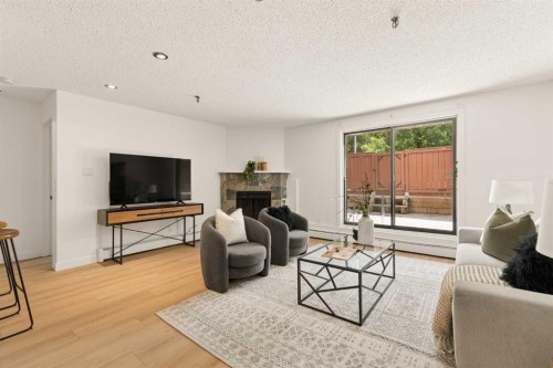 101-930 18 Avenue Sw, Calgary, AB - Indoor Photo Showing Living Room