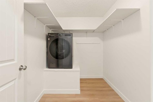 101-930 18 Avenue Sw, Calgary, AB - Indoor Photo Showing Laundry Room