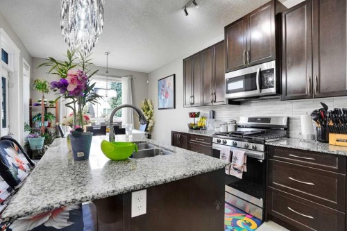 1239 Brightoncrest Green Se, Calgary, AB - Indoor Photo Showing Kitchen With Double Sink With Upgraded Kitchen