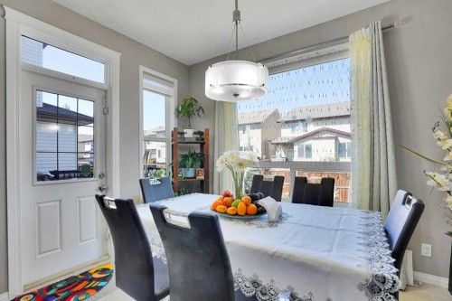 1239 Brightoncrest Green Se, Calgary, AB - Indoor Photo Showing Dining Room