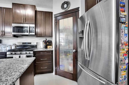 1239 Brightoncrest Green Se, Calgary, AB - Indoor Photo Showing Kitchen With Upgraded Kitchen