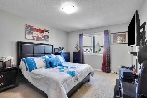 1239 Brightoncrest Green Se, Calgary, AB - Indoor Photo Showing Bedroom