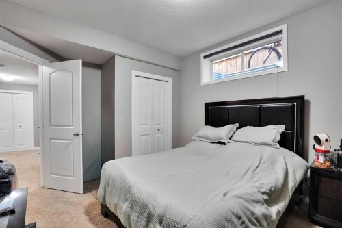 1239 Brightoncrest Green Se, Calgary, AB - Indoor Photo Showing Bedroom