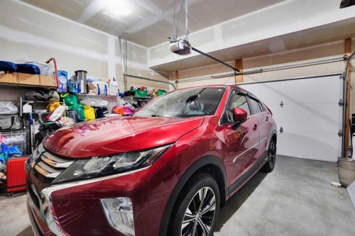 1239 Brightoncrest Green Se, Calgary, AB - Indoor Photo Showing Garage