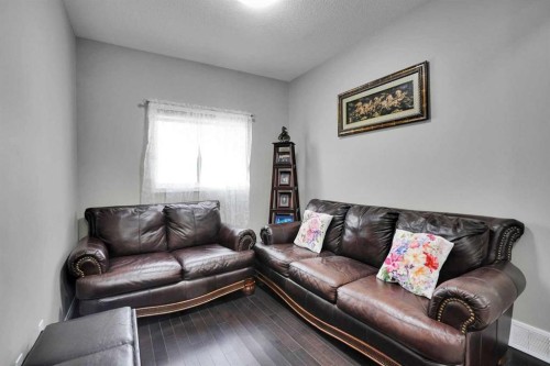 1239 Brightoncrest Green Se, Calgary, AB - Indoor Photo Showing Living Room