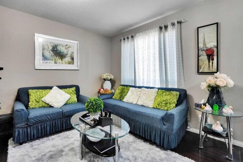 1239 Brightoncrest Green Se, Calgary, AB - Indoor Photo Showing Living Room