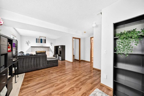 3628 Catalina Boulevard Ne, Calgary, AB - Indoor With Fireplace
