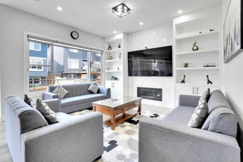 36 Waterford Terrace, Chestermere, AB - Indoor Photo Showing Living Room With Fireplace