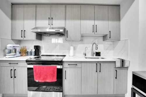 36 Waterford Terrace, Chestermere, AB - Indoor Photo Showing Kitchen With Upgraded Kitchen