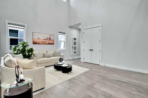 36 Waterford Terrace, Chestermere, AB - Indoor Photo Showing Living Room