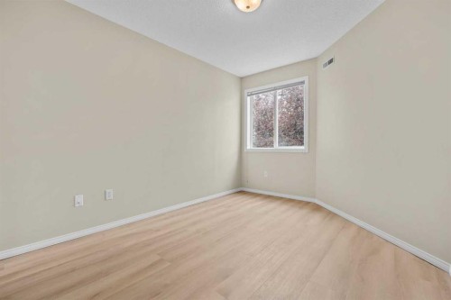 1203-1818 Simcoe Boulevard Sw, Calgary, AB - Indoor Photo Showing Other Room