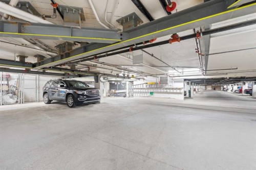 1203-1818 Simcoe Boulevard Sw, Calgary, AB - Indoor Photo Showing Garage