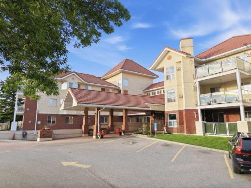 1203-1818 Simcoe Boulevard Sw, Calgary, AB - Outdoor With Balcony With Facade