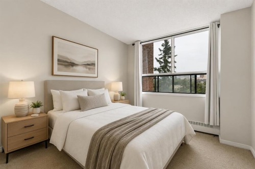 401-145 Point Drive Nw, Calgary, AB - Indoor Photo Showing Bedroom