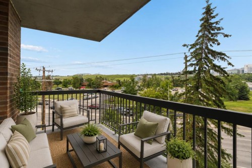 401-145 Point Drive Nw, Calgary, AB - Outdoor With Exterior