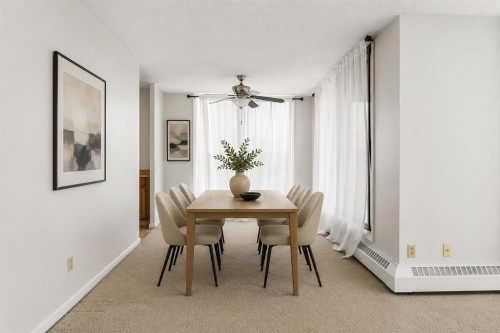 401-145 Point Drive Nw, Calgary, AB - Indoor Photo Showing Dining Room