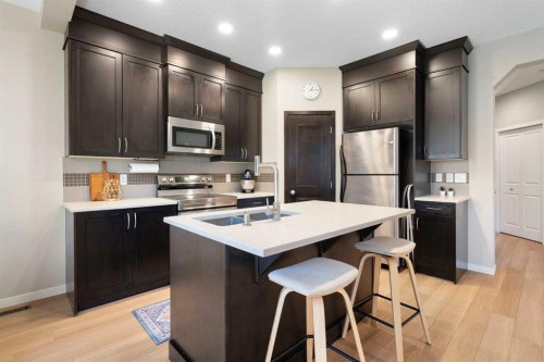 1258 New Brighton Drive Se, Calgary, AB - Indoor Photo Showing Kitchen With Stainless Steel Kitchen With Upgraded Kitchen
