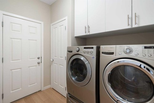 1258 New Brighton Drive Se, Calgary, AB - Indoor Photo Showing Laundry Room