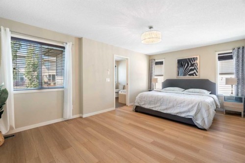 1258 New Brighton Drive Se, Calgary, AB - Indoor Photo Showing Bedroom