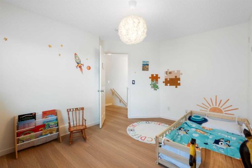 1258 New Brighton Drive Se, Calgary, AB - Indoor Photo Showing Bedroom