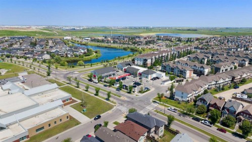 1258 New Brighton Drive Se, Calgary, AB - Outdoor With Body Of Water With View