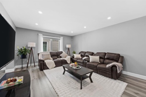 52 Windstone Green Sw, Airdrie, AB - Indoor Photo Showing Living Room