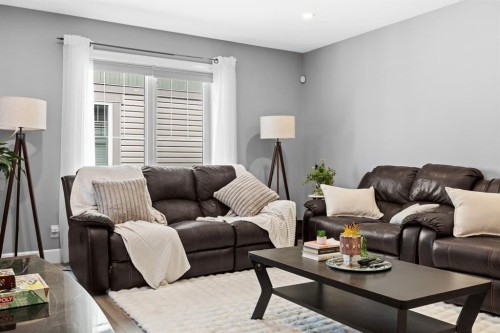 52 Windstone Green Sw, Airdrie, AB - Indoor Photo Showing Living Room
