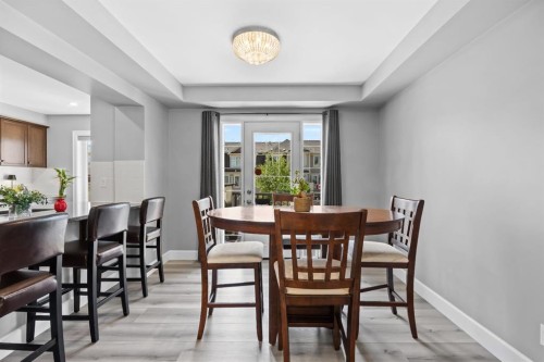 52 Windstone Green Sw, Airdrie, AB - Indoor Photo Showing Dining Room