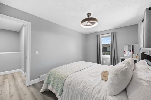 52 Windstone Green Sw, Airdrie, AB - Indoor Photo Showing Bedroom