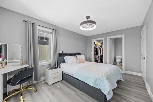 52 Windstone Green Sw, Airdrie, AB - Indoor Photo Showing Bedroom
