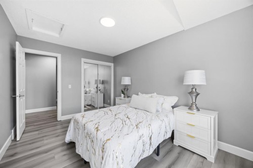 52 Windstone Green Sw, Airdrie, AB - Indoor Photo Showing Bedroom