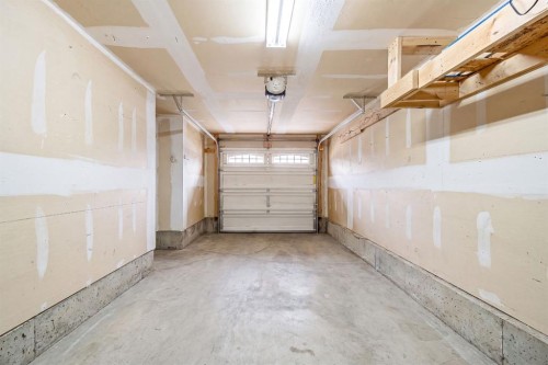 52 Windstone Green Sw, Airdrie, AB - Indoor Photo Showing Garage