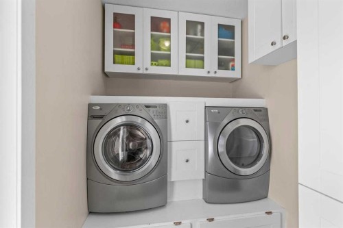 317 Mcleod Crescent, Diamond Valley, AB - Indoor Photo Showing Laundry Room