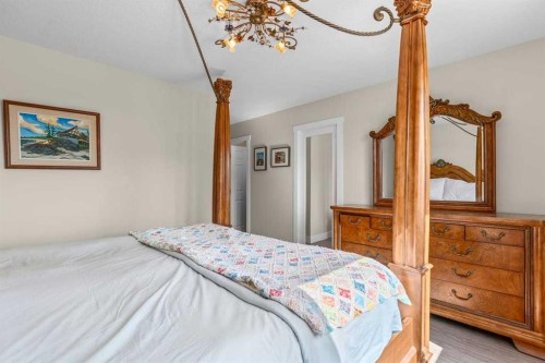 317 Mcleod Crescent, Diamond Valley, AB - Indoor Photo Showing Bedroom